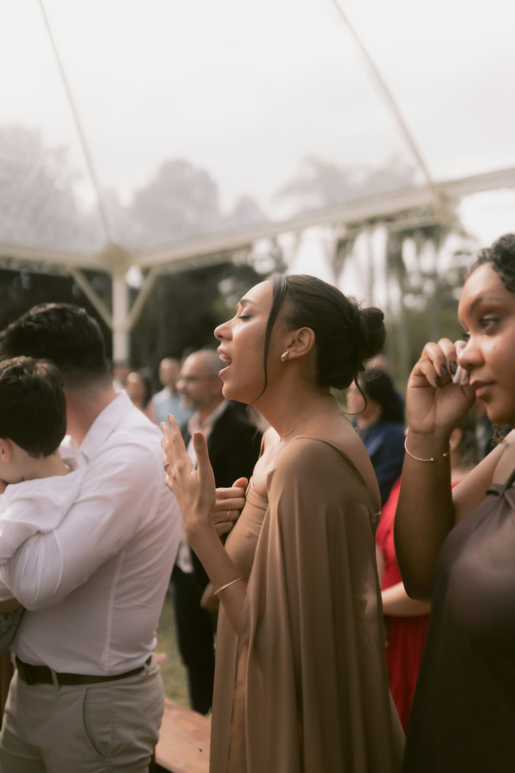 Guests laughing at the reception