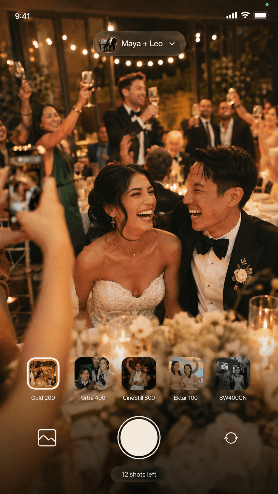 A wedding guest using the Gooya camera — film filters and a shots-left counter over a candlelit reception